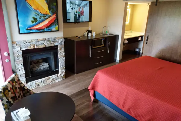 Fireplace suite seating area with table and chairs
