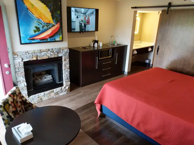 Fireplace suite seating area with table and chairs