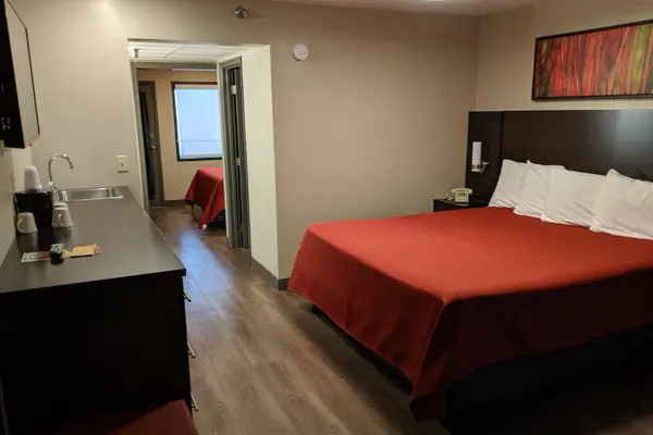 Queen bed with sliding barn door